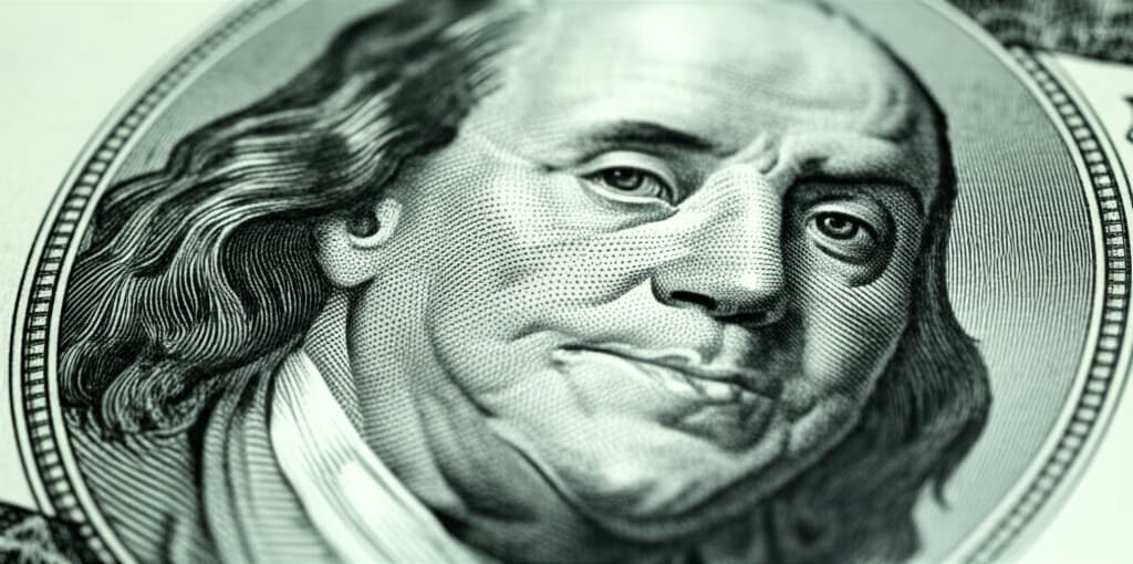 Close-up, highly detailed, realistic image of a US dollar paper money banknote, showcasing its intricate security features, texture, and watermark.